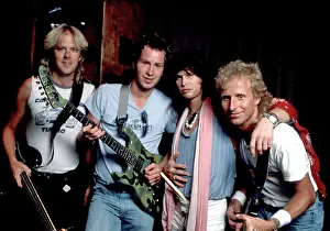 John McEnroe Prints: John McEnroe and Vitas Gerulaitis learn guitar with Aerosmith
