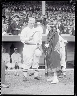 John J Prints: John McGraw Receiving a Tomahawk