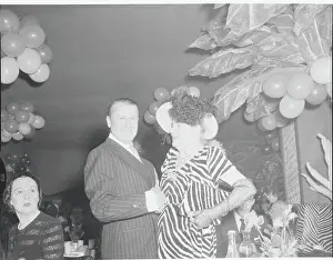 John Perona Chatting with El Morocco Guest