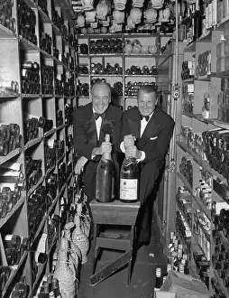 John Perona Posing in Wine Cellar
