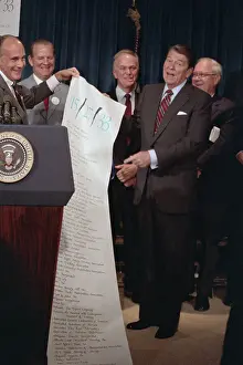 John Richman with Lengthy Scroll on Tax Reform