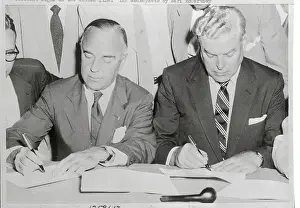 Mcdonald Prints: John Stephens and David McDOnald Signing Paper