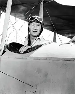 Cockpit Prints: John Wayne In Airplane Cockpit/Movie