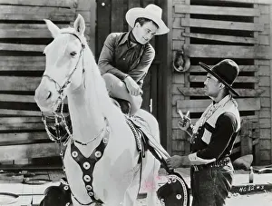 John Wayne On Horse/Movie/Black Cowboy