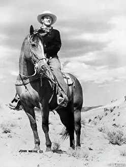 Rugged Prints: John Wayne on Horseback