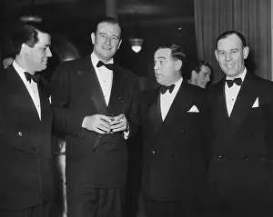 Tuxedo Prints: John Wayne At The UK Premiere Party For Rio Grande