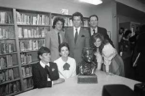 Dedication Prints: John Wayne's Children Around Bust of Him