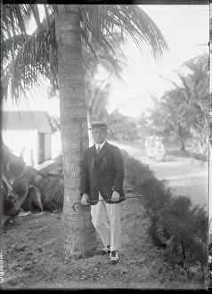 John N Prints: John Willys Leaning Against a Tree