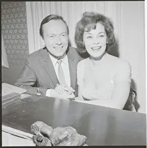 Johnnie Johnston Smiling with His Wife