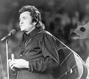 Johnny Cash Performing with Guitar