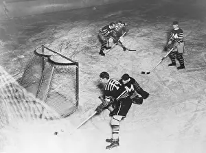 Prints of Chicago, Illinois Frozen Moments: A Journey Through Hockey History: Johnny Gotteslig Playing Ice Hockey
