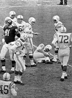 Johnny Unitas Holding Leg in Pain