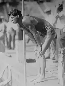 Johnny Weismuller Posing In His Swimsuit