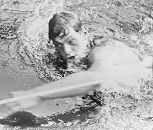 Powerful Prints: Johnny Weismuller Winning Swim Race