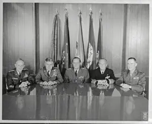 Joint Chiefs of Staff Standing Near Flags