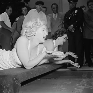 Prints of American actresses Marilyn Monroe (1926 - 1962) Hollywood's Sultry Siren – A Photographic Tribute: Joint Handprint Ceremony