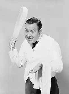 Jonathan Winters as a Waiter