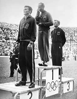 Helsinki Prints: Joseph Bartel hilding his Olympic Gold Medal
