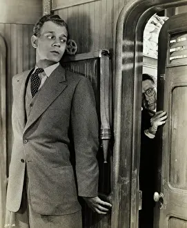 Joseph Cotten in Movie Scene at Door