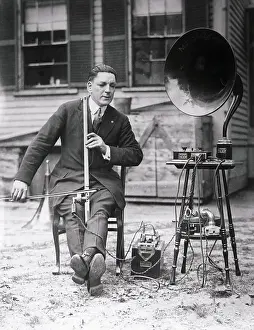 Lowell Prints: Joseph J McCrann Posing with Radio Apparatus