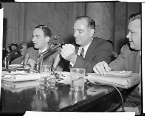 Joseph McCarthy Holding Eyeglasses at Hearing