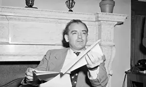 Joseph McCarthy Seated Holding Papers
