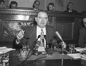 Joseph McCarthy Sitting Behind Microphones