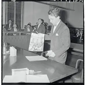 Joseph Papp Holding Magazine