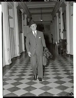 Joseph Patrick Kennedy Walking Down Hallway