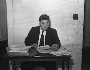 Joseph R.. Brodsky Sitting at Courtroom Table