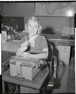 Joyce Brothers Sitting By a Typewriter