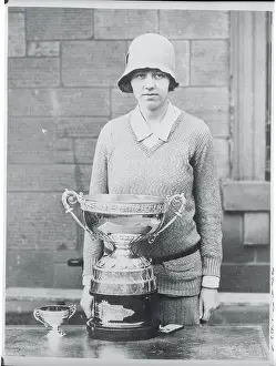 Joyce Wethered Posing with Her Trophy Cup