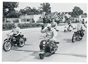 Juan Peron Leading a Motor Scooter Parade