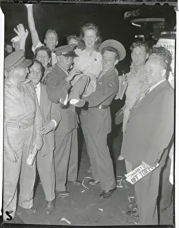 Jubilant Citizens and Sailors in Street