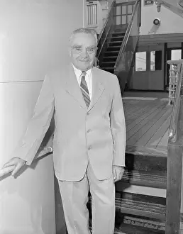 Judge Learned Hand Standing at Base of Liner Staircase