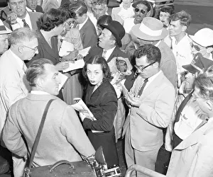 Judith Coplon Surrounded by Reporters