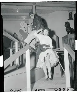 Judy Barrett in Frilly Dress on Colorful Set