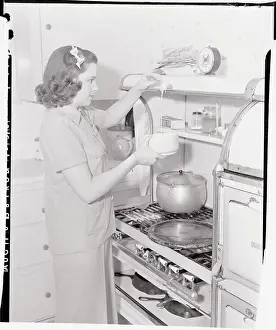 Judy Garland Cooking at Stove