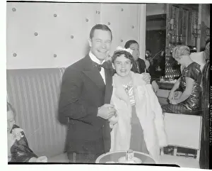 Joe E Prints: Judy Garland Being Embraced by Joe E. Brown
