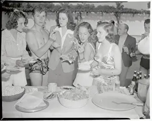 Judy Garland and Friends Standing at Banquet Table