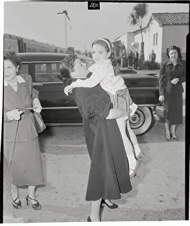 Judy Garland Holding and Embracing Her Daughter Liza