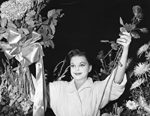 Surrounding Prints: Judy Garland Holding Flowers