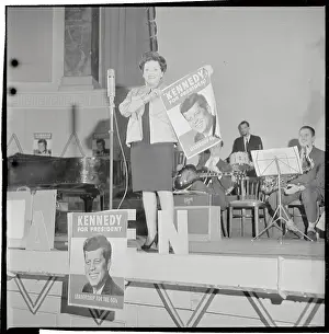 Judy Garland Holding Up Kennedy Poster