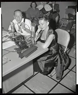 Judy Garland and Jack Eigen Talking in Radio Microphones
