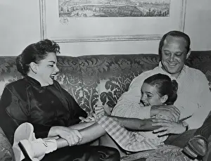 Judy Garland and Sid Luft Sitting on Couch with Her Daughter Liza