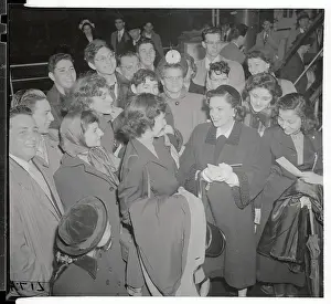 Judy Garland Signing Autograph in Crowd of Fans