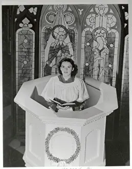 Judy Garland Sitting with Book