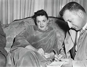 Judy Garland Sitting on Couch