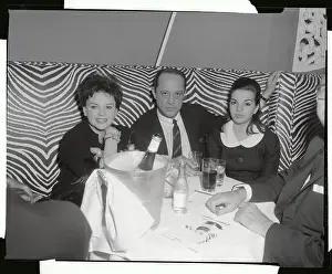 Judy Garland Sitting with Daughter and Friends