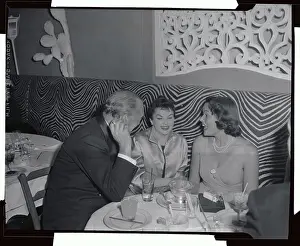 Judy Garland Sitting with Gene Tierney and Michael Curtiz
